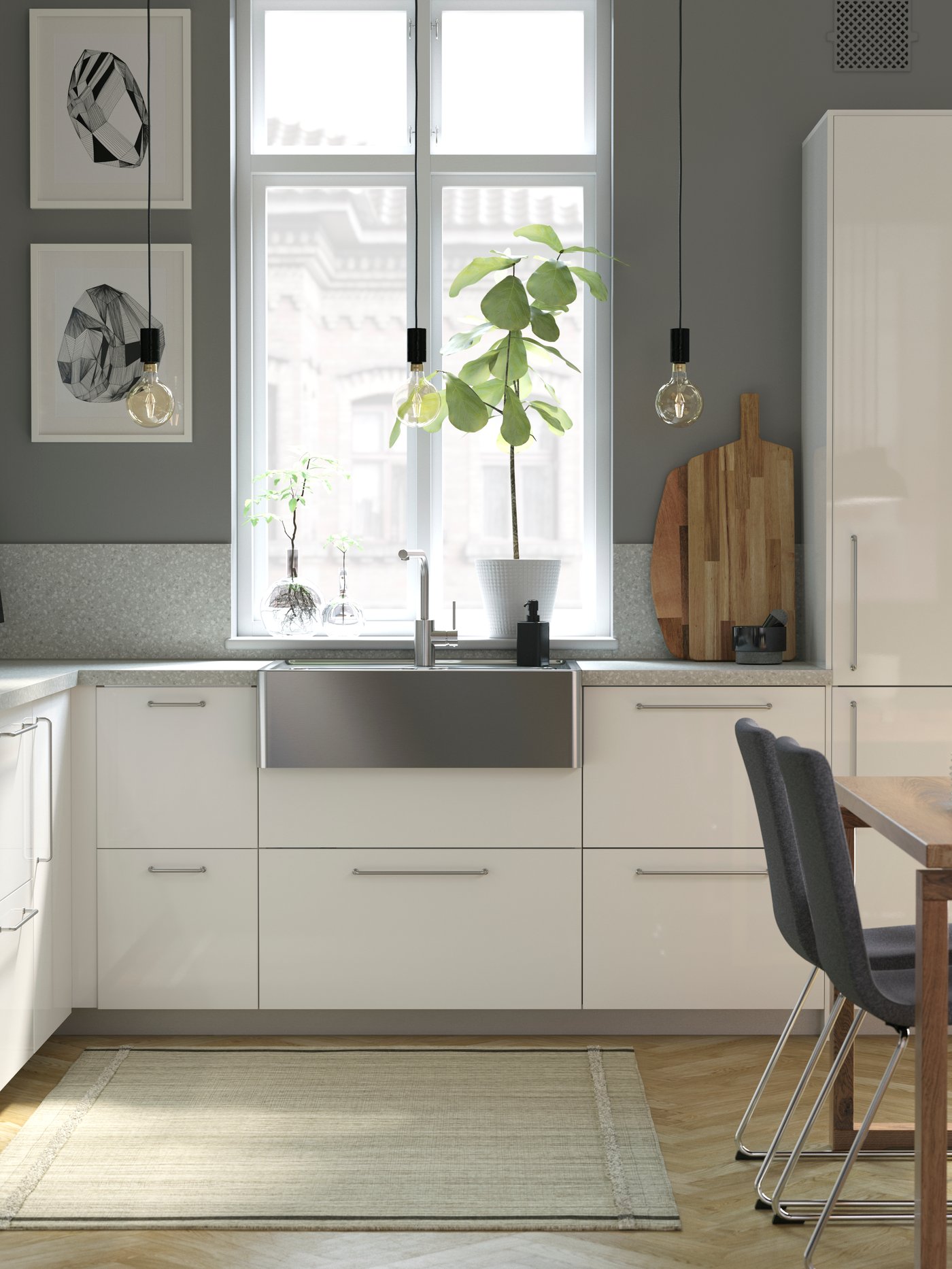 A grey RINNIG soap dispenser in the kitchen