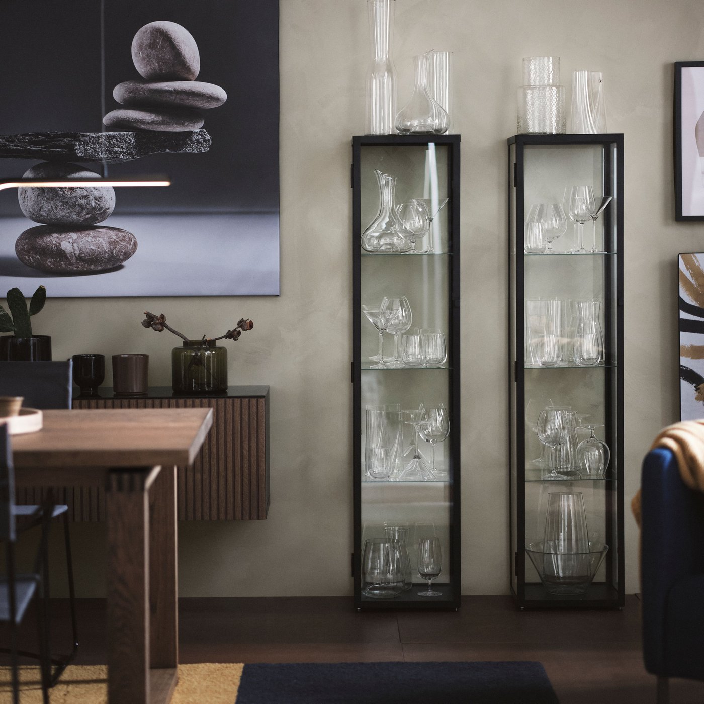 A black BLÅLIDEN glass-door cabinet