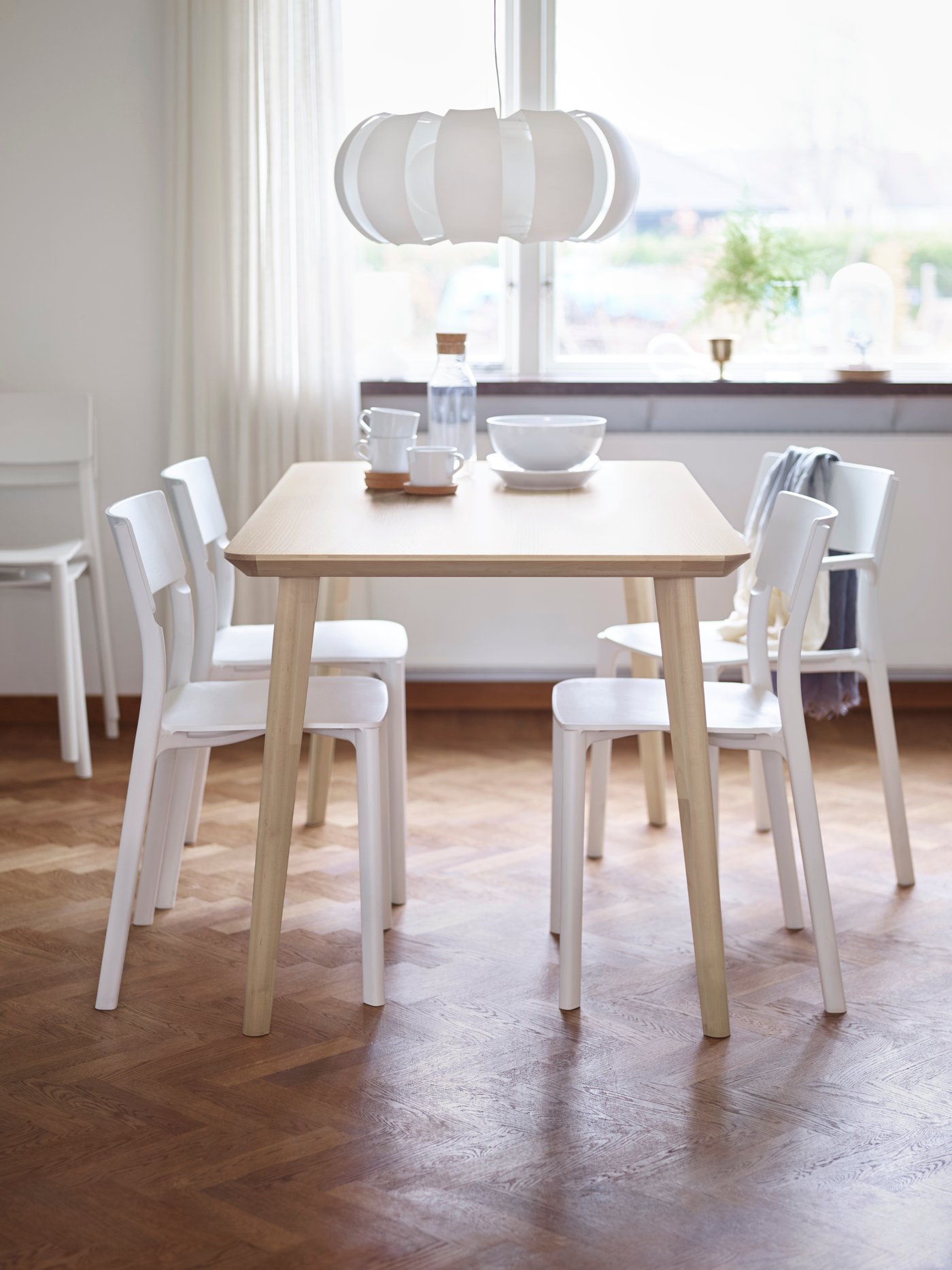 A white STOCKHOLM pendant lamp
