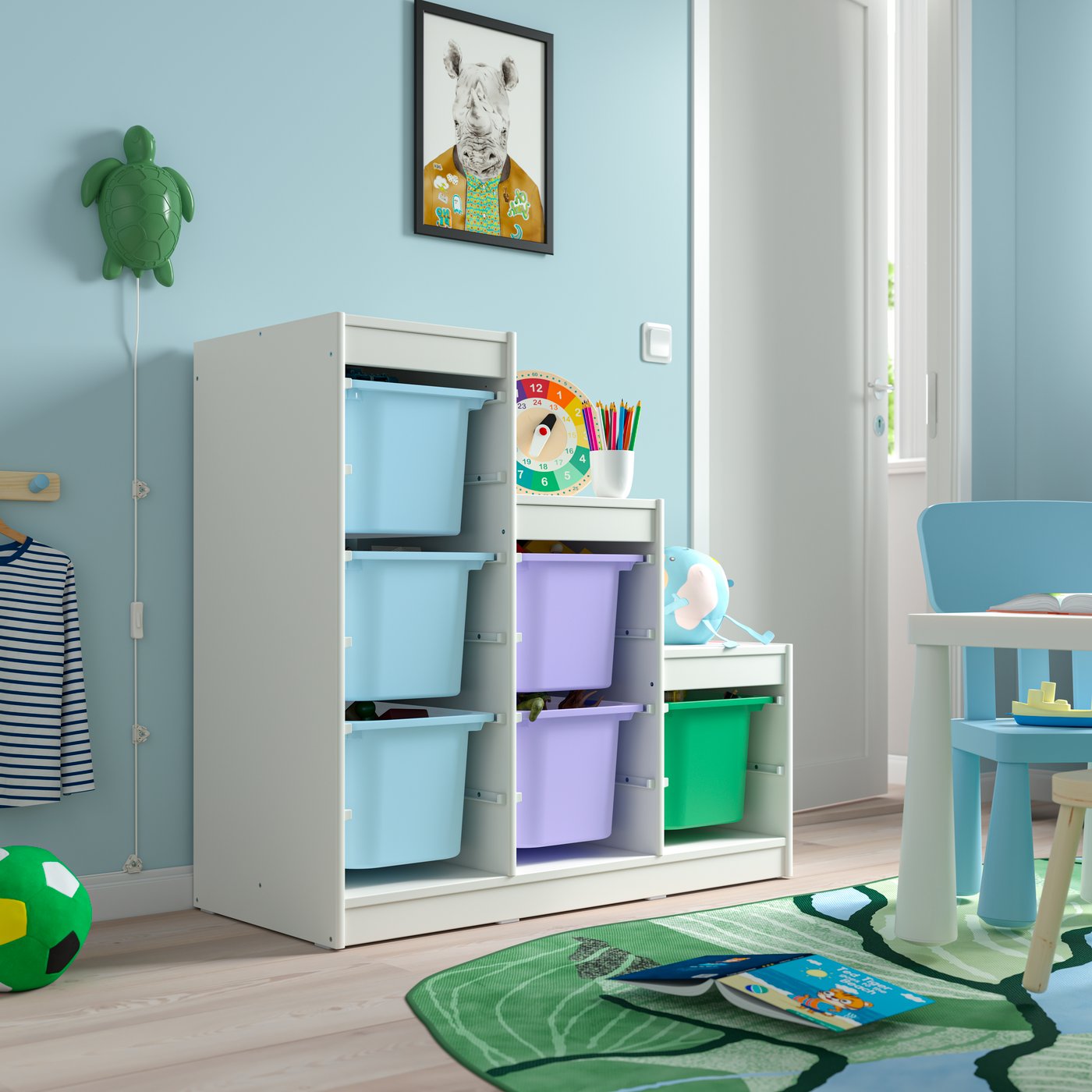 A bright green TROFAST storage box in the childrens room