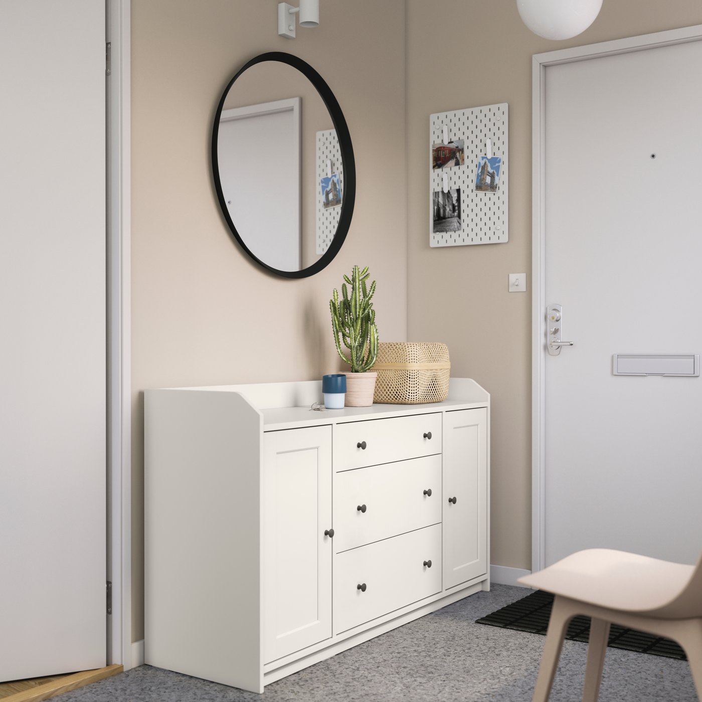 A white HAUGA sideboard in main entrance/hallway