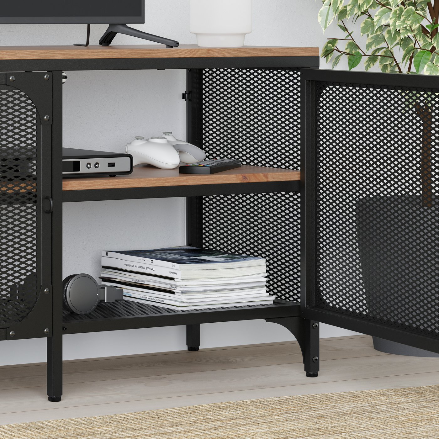 A black FJÄLLBO TV bench