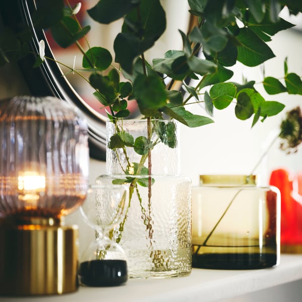 Retro KONSTFULL vases with flowers.