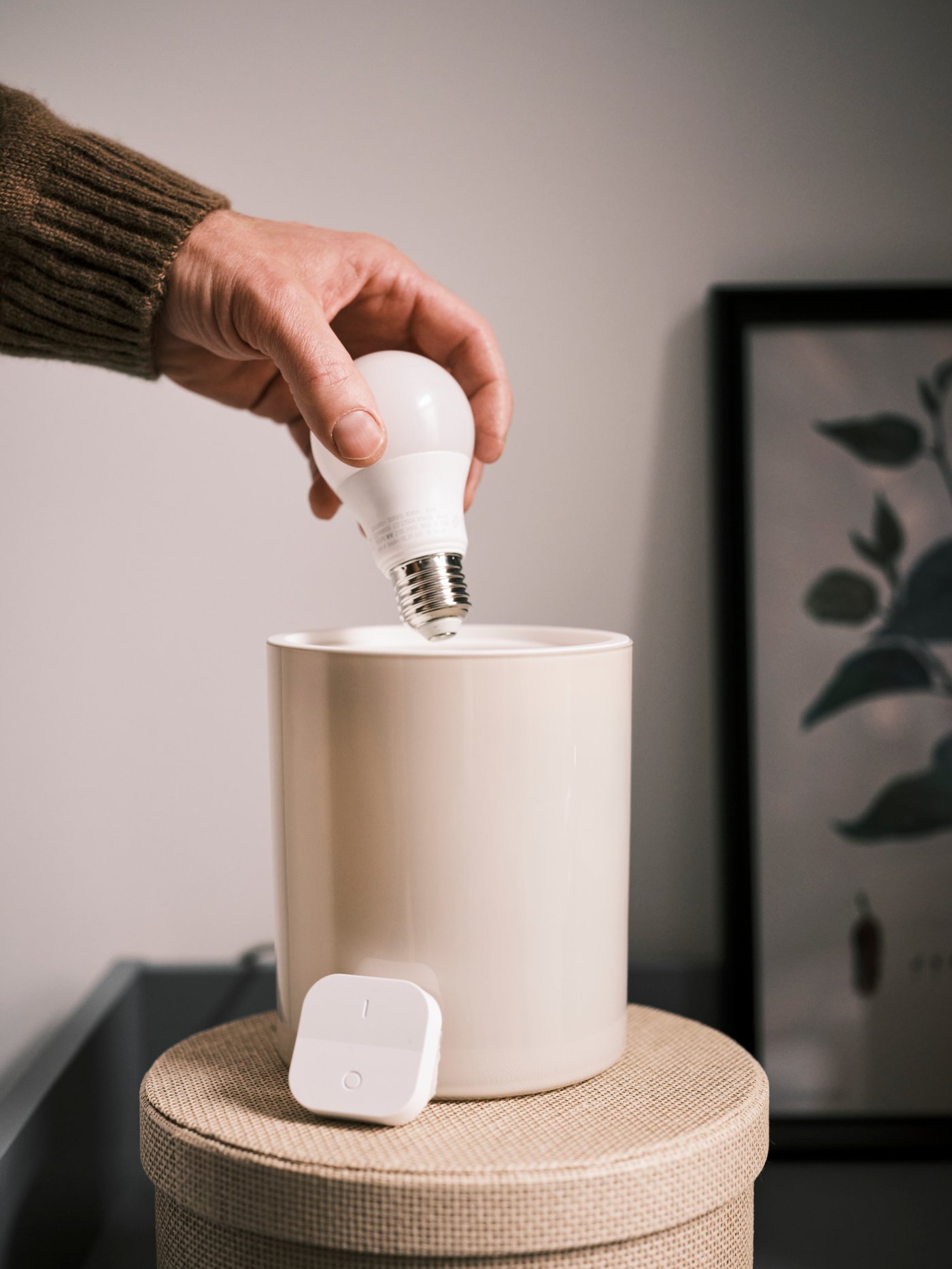 Een beige opbergdoos KVARNVIK