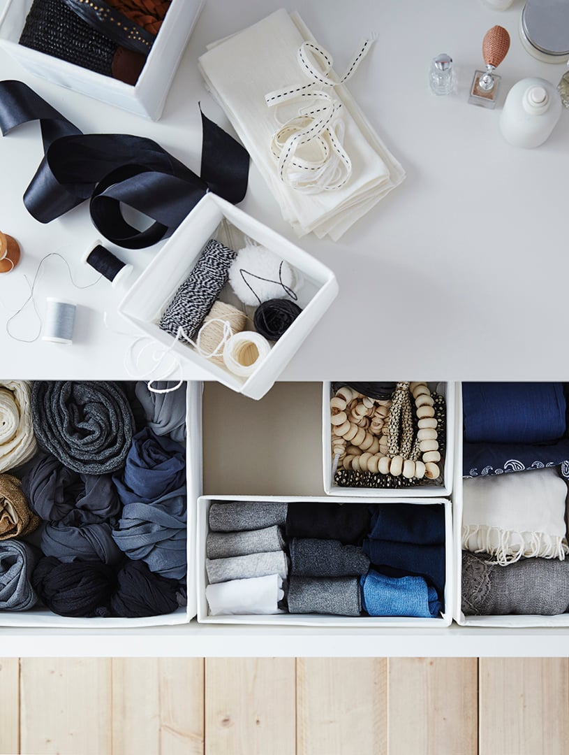 IKEA SKUBB white boxes, set of 6 in the drawer of a chest of drawers in the bedroom.