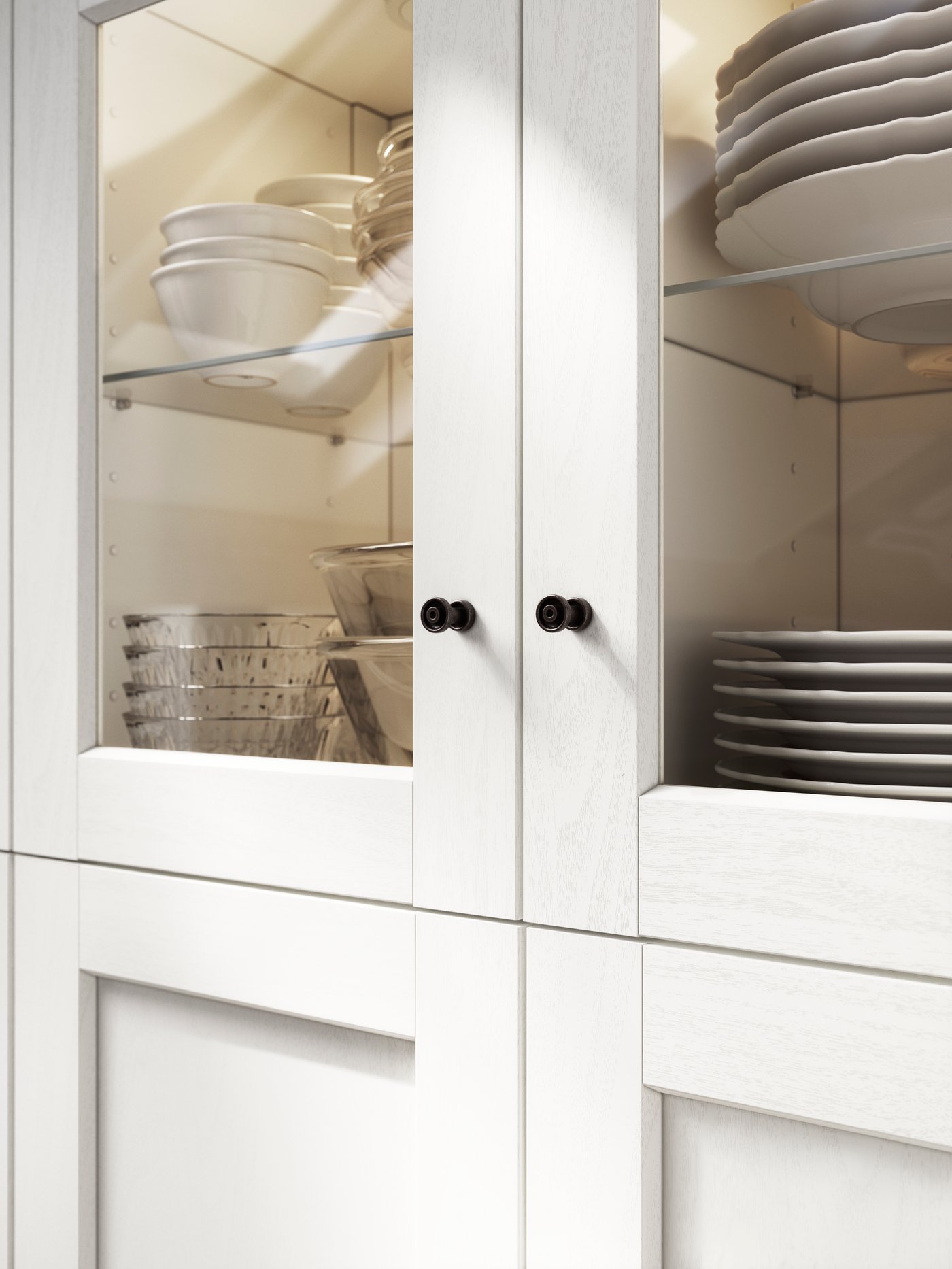 A white wood effect ENKÖPING glass door in the kitchen
