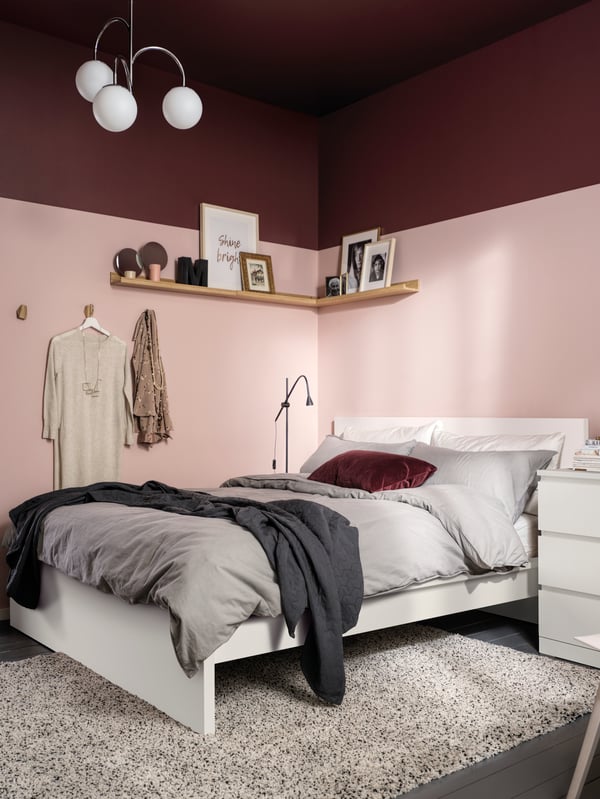 A chrome-plated/opal white glass SIMRISHAMN pendant lamp, 3-armed in the bedroom