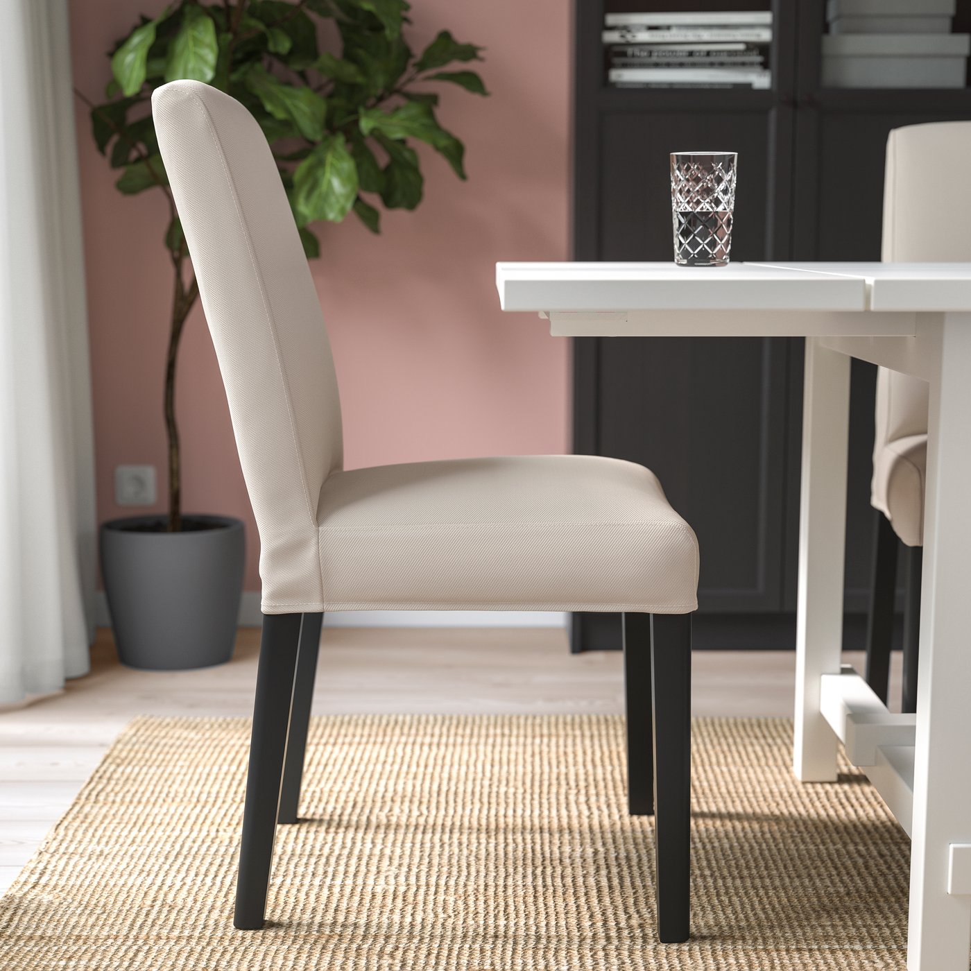 A black/Hallarp beige BERGMUND chair