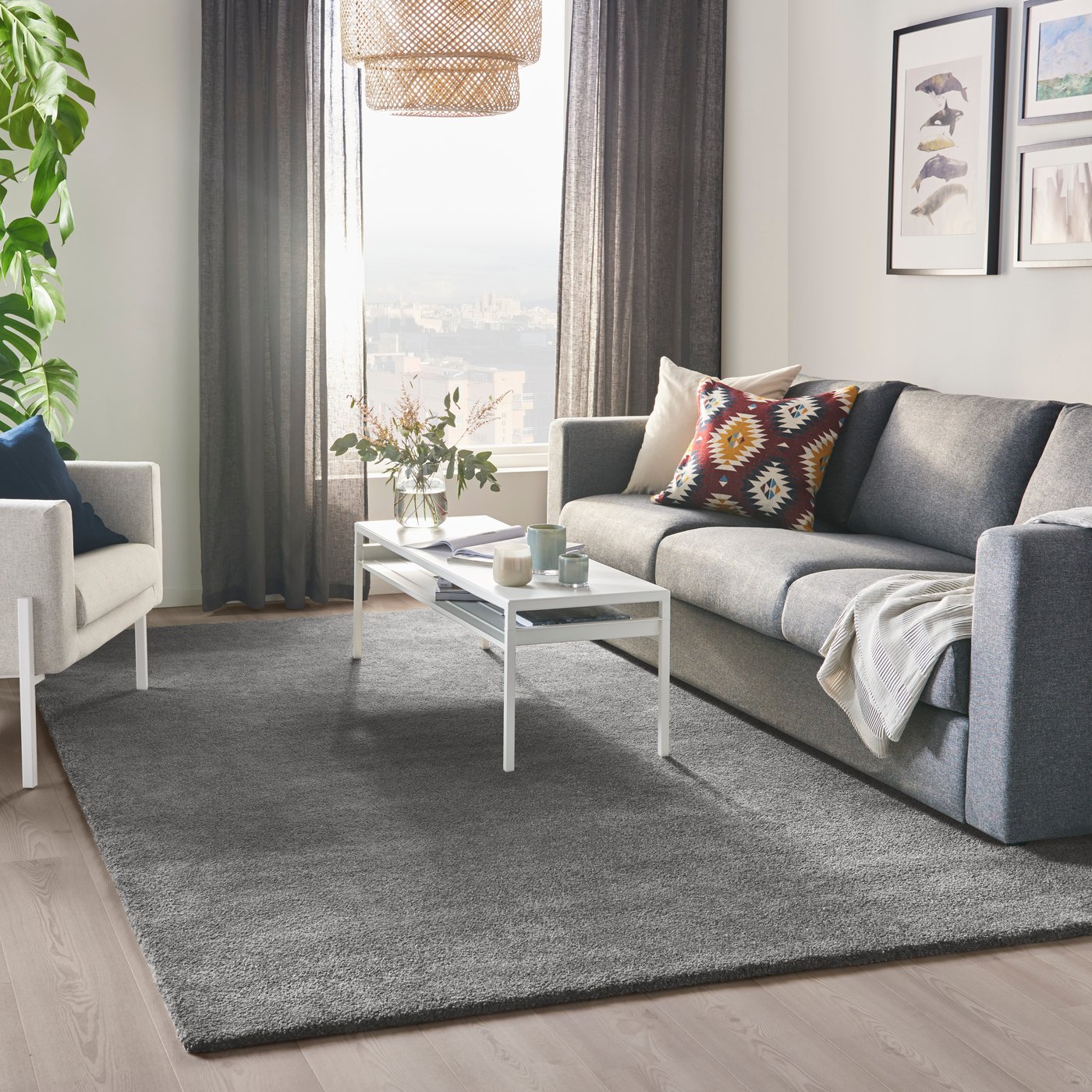A medium grey STOENSE rug, low pile