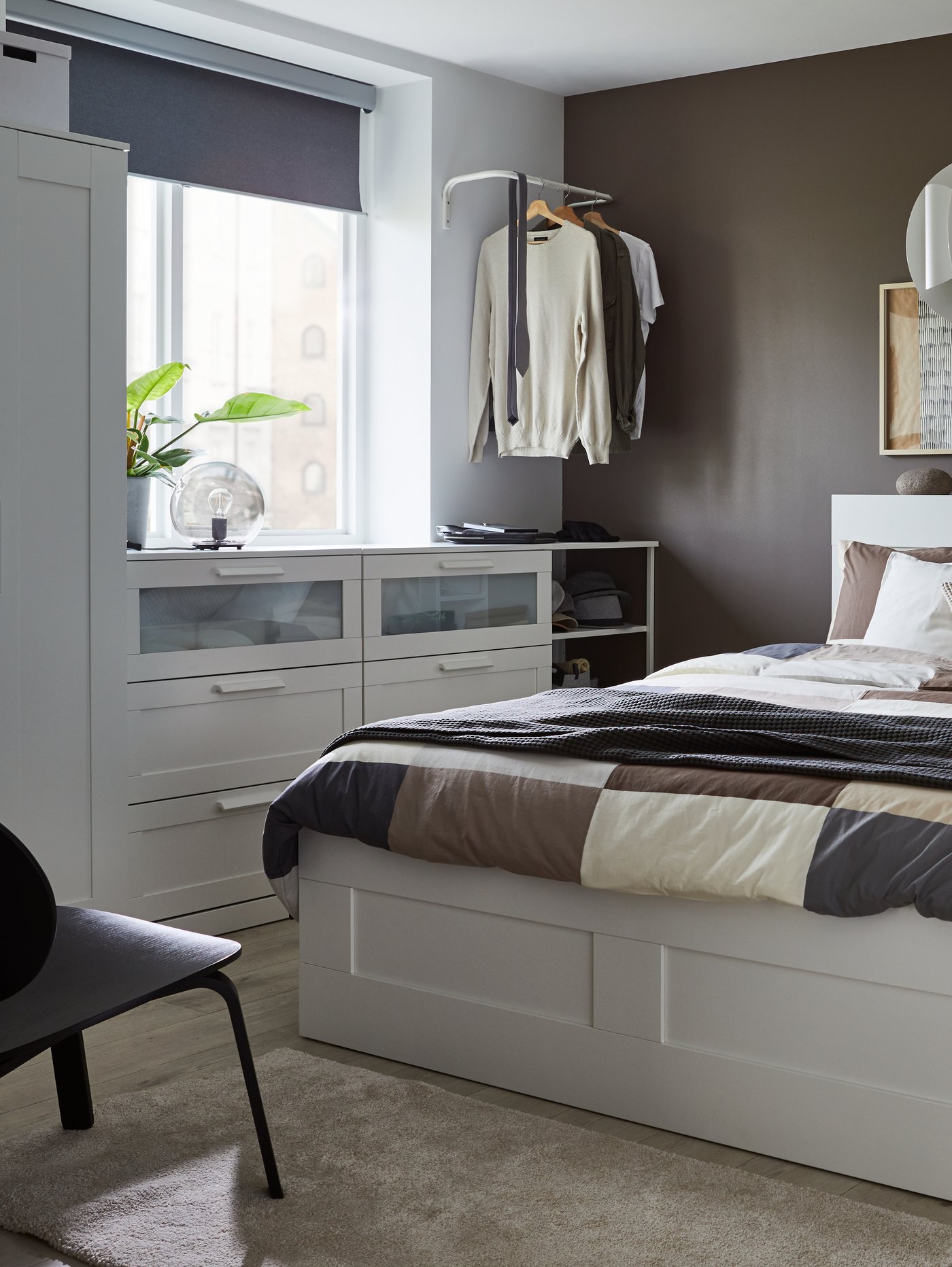 A white/Luröy BRIMNES bed frame w storage and headboard in the bedroom
