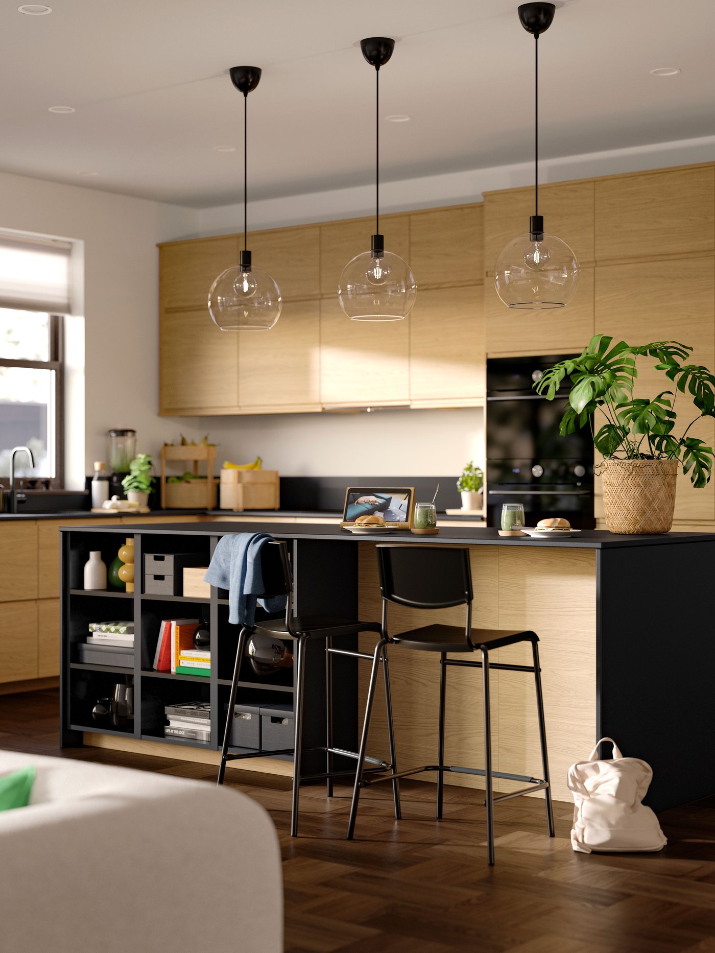A matt black/stone effect high pressure porcelain MÖCKLARP custom made worktop in the kitchen