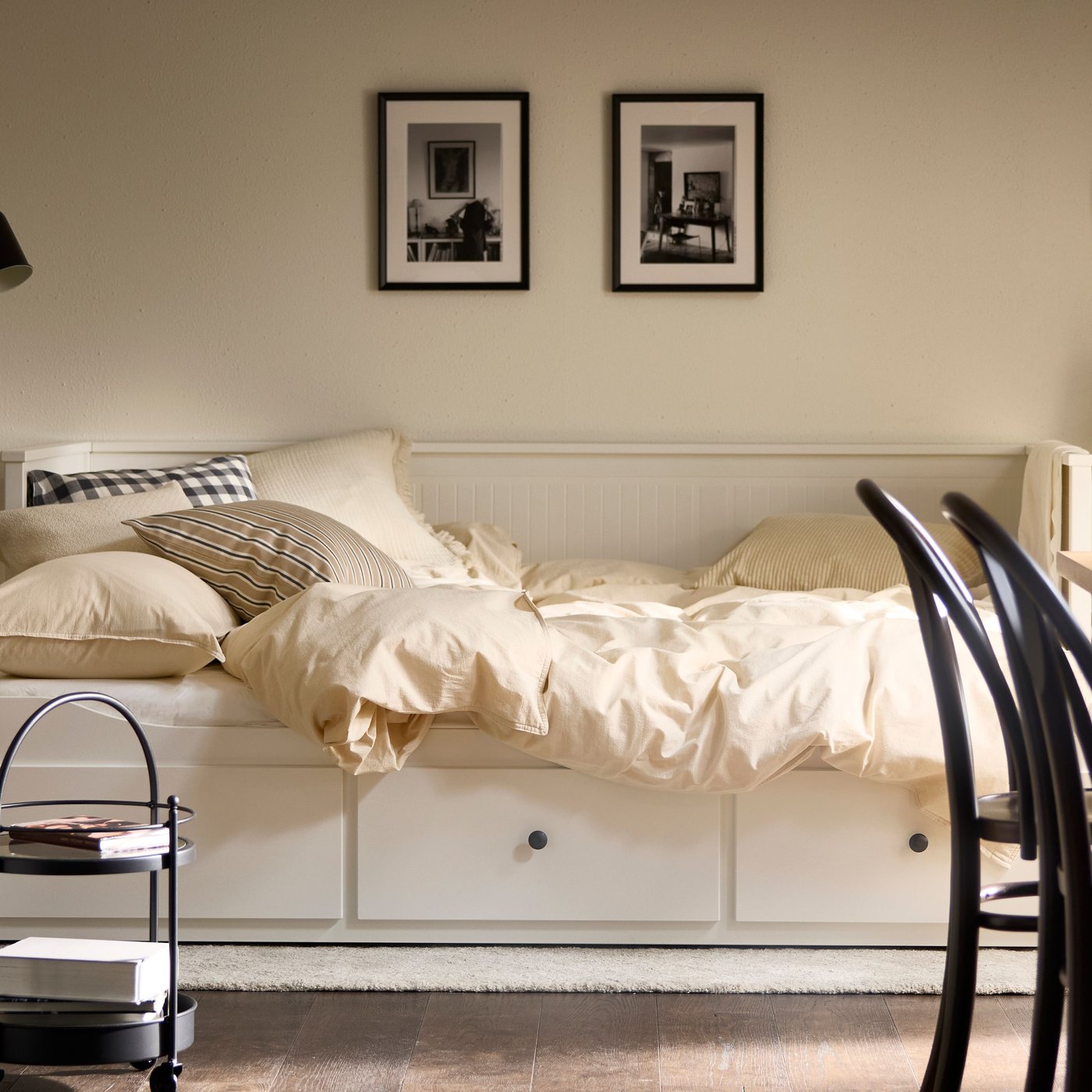 An anthracite white/check EKTANDVINGE duvet cover and pillowcase