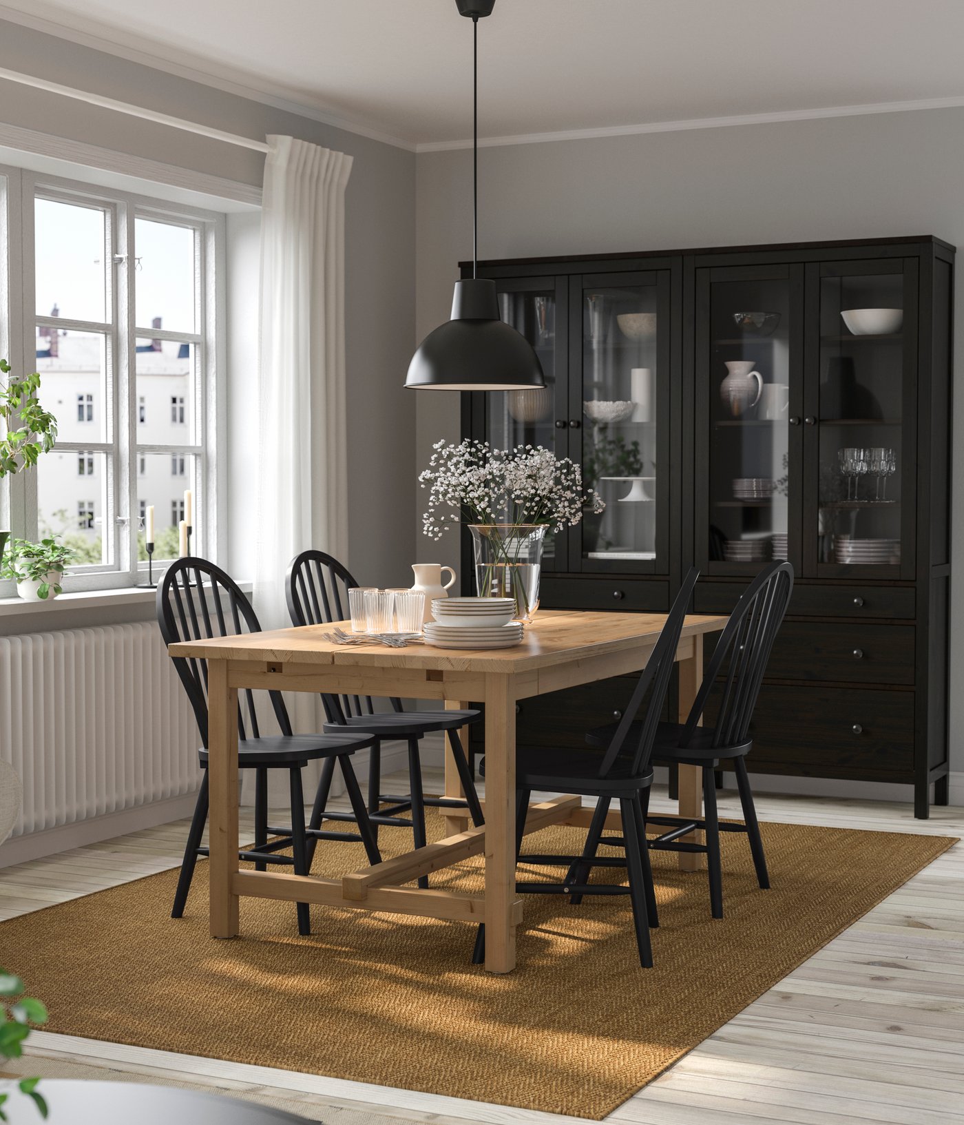 An antique stain/black NORDVIKEN table and 4 chairs in the dining room
