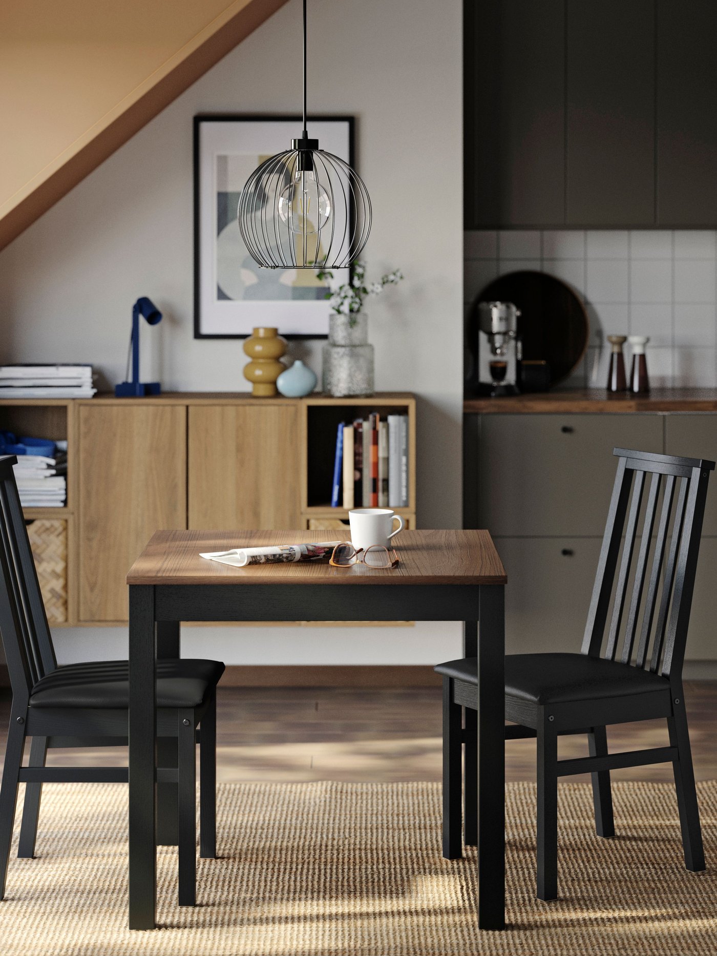 A black/Bomstad black ÅLHULT chair in the dining room