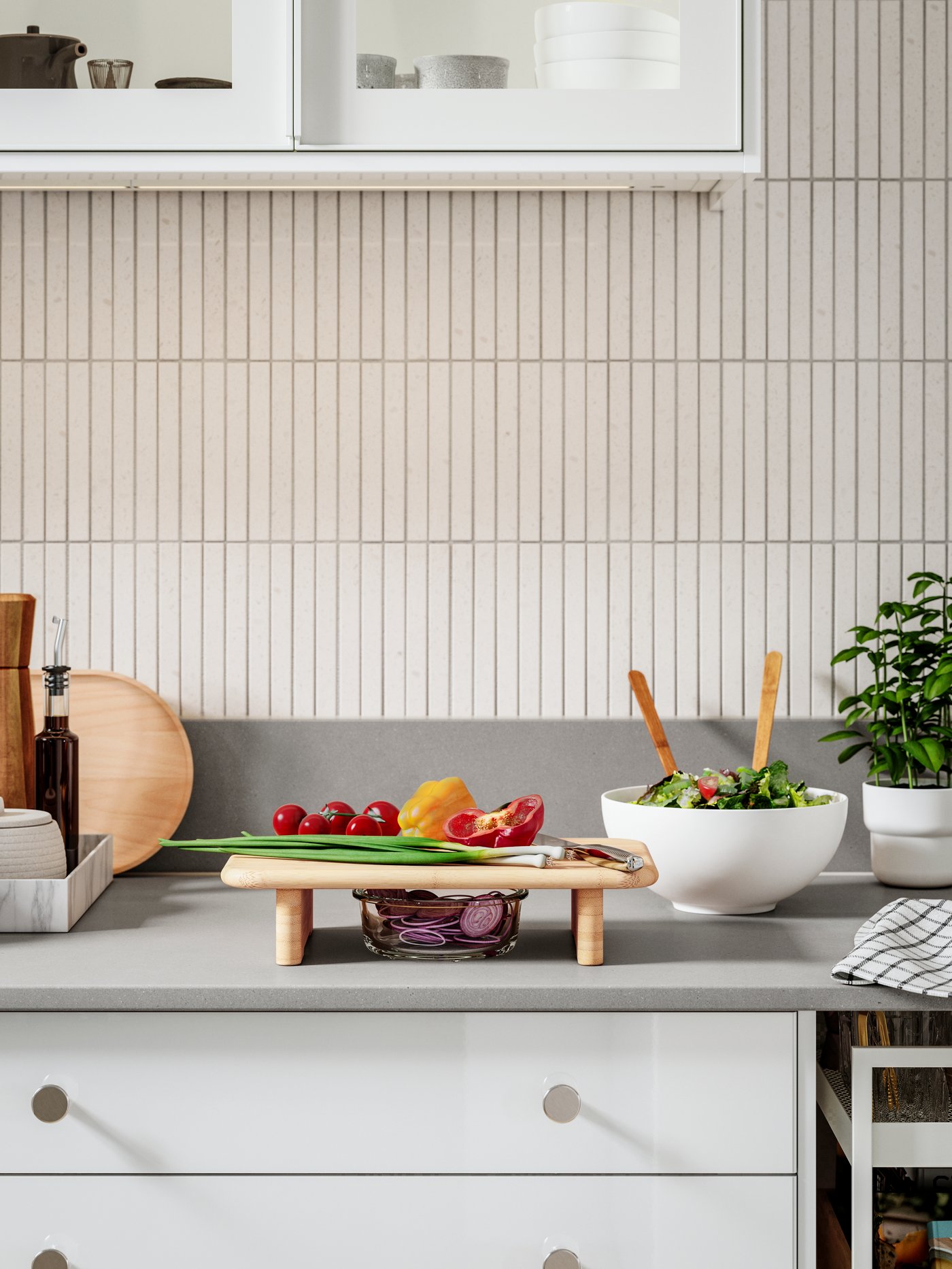 An in/outdoor white FÖRENLIG plant pot in the kitchen