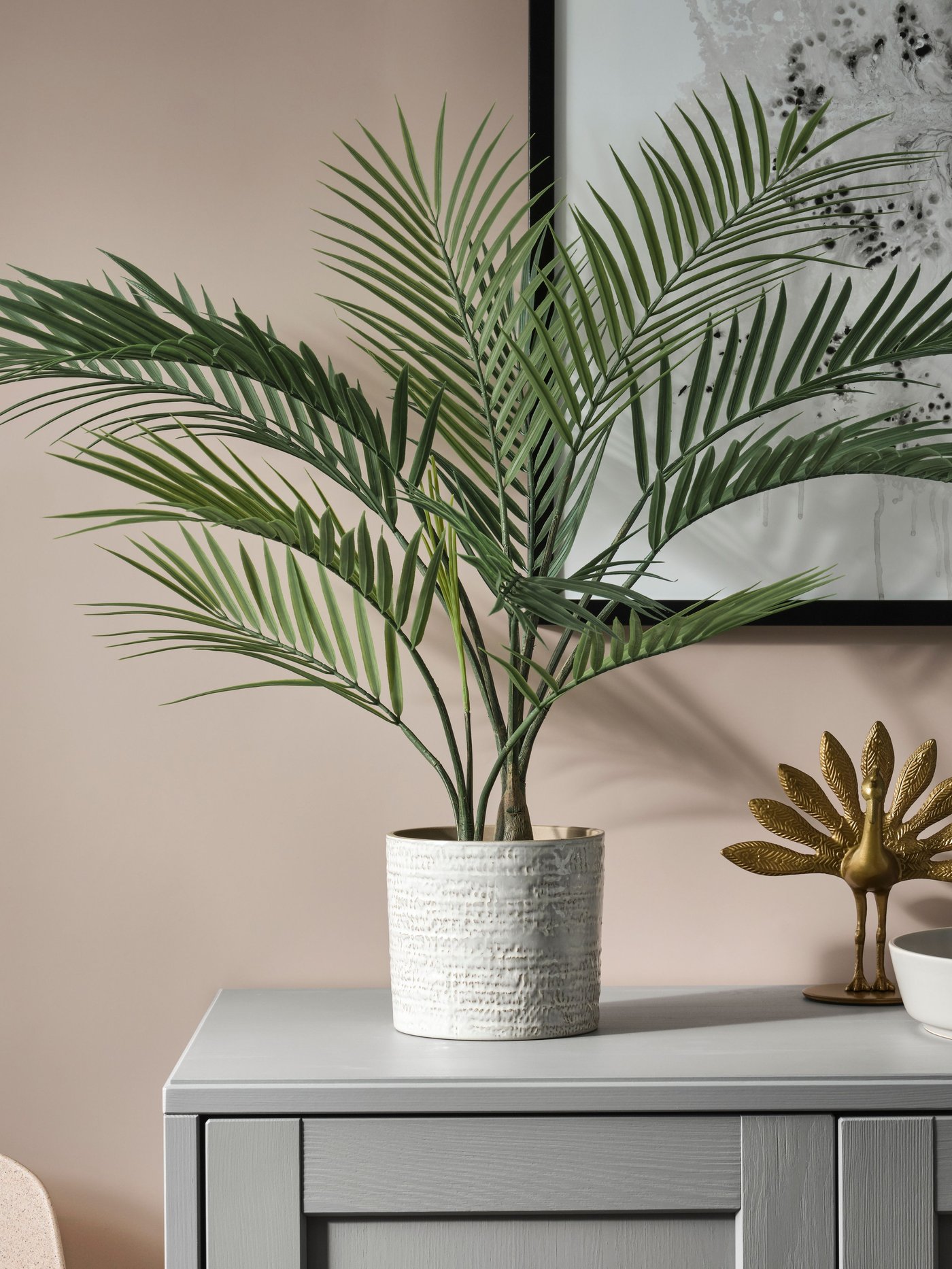 Künstliche FEJKA Areca‑Palme in einem Topf für Innen‑ und Außenbereiche.