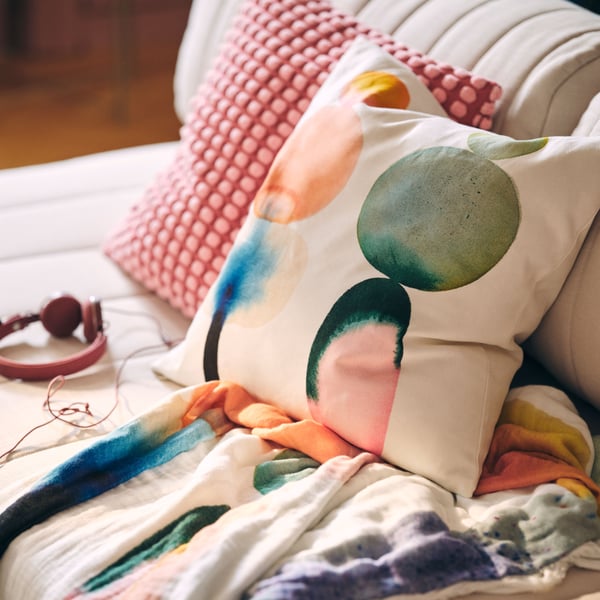 A white/multicolour IKEA PS 2026 cushion cover