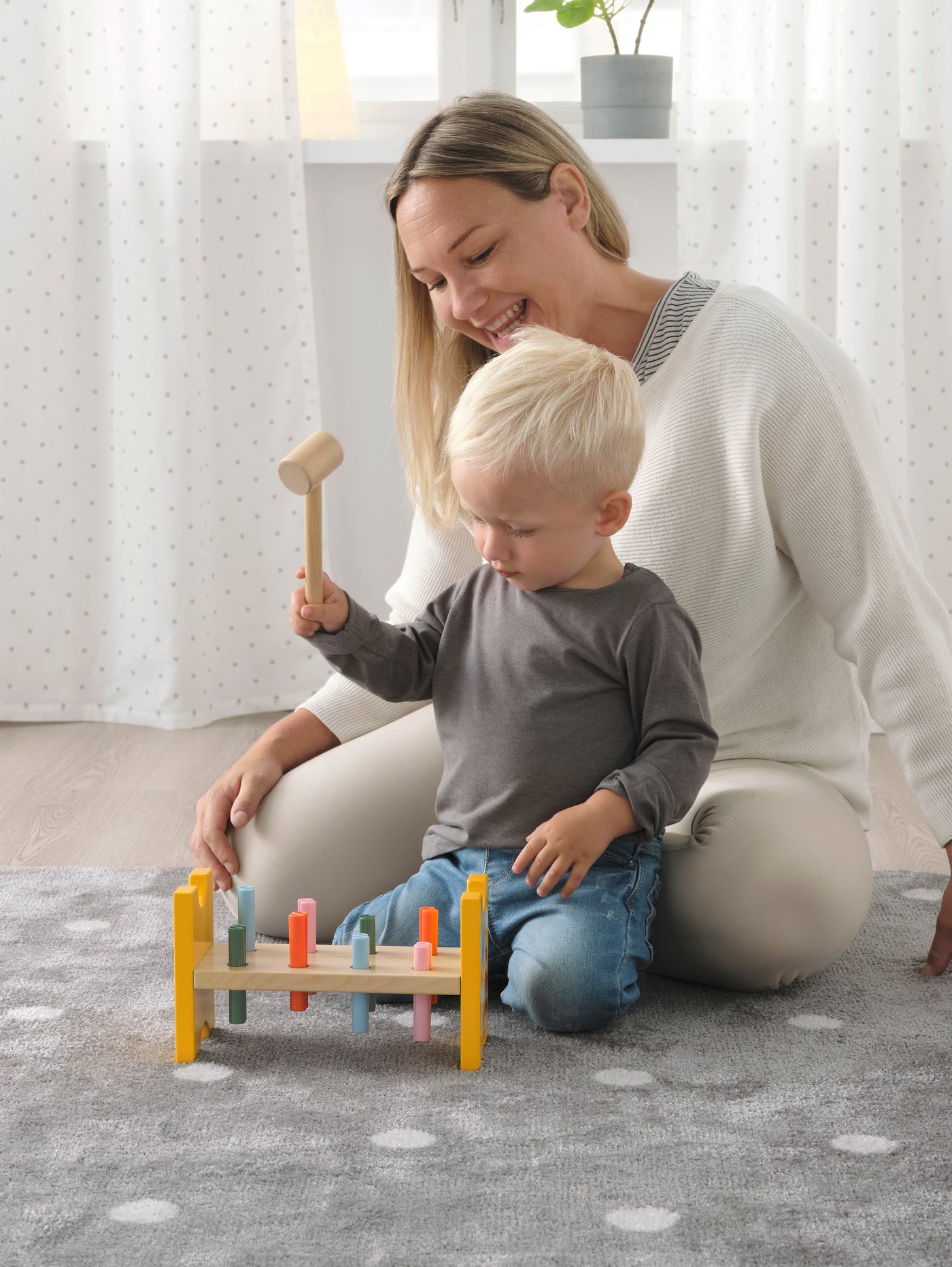 A multicolour UPPSTÅ toy hammering block