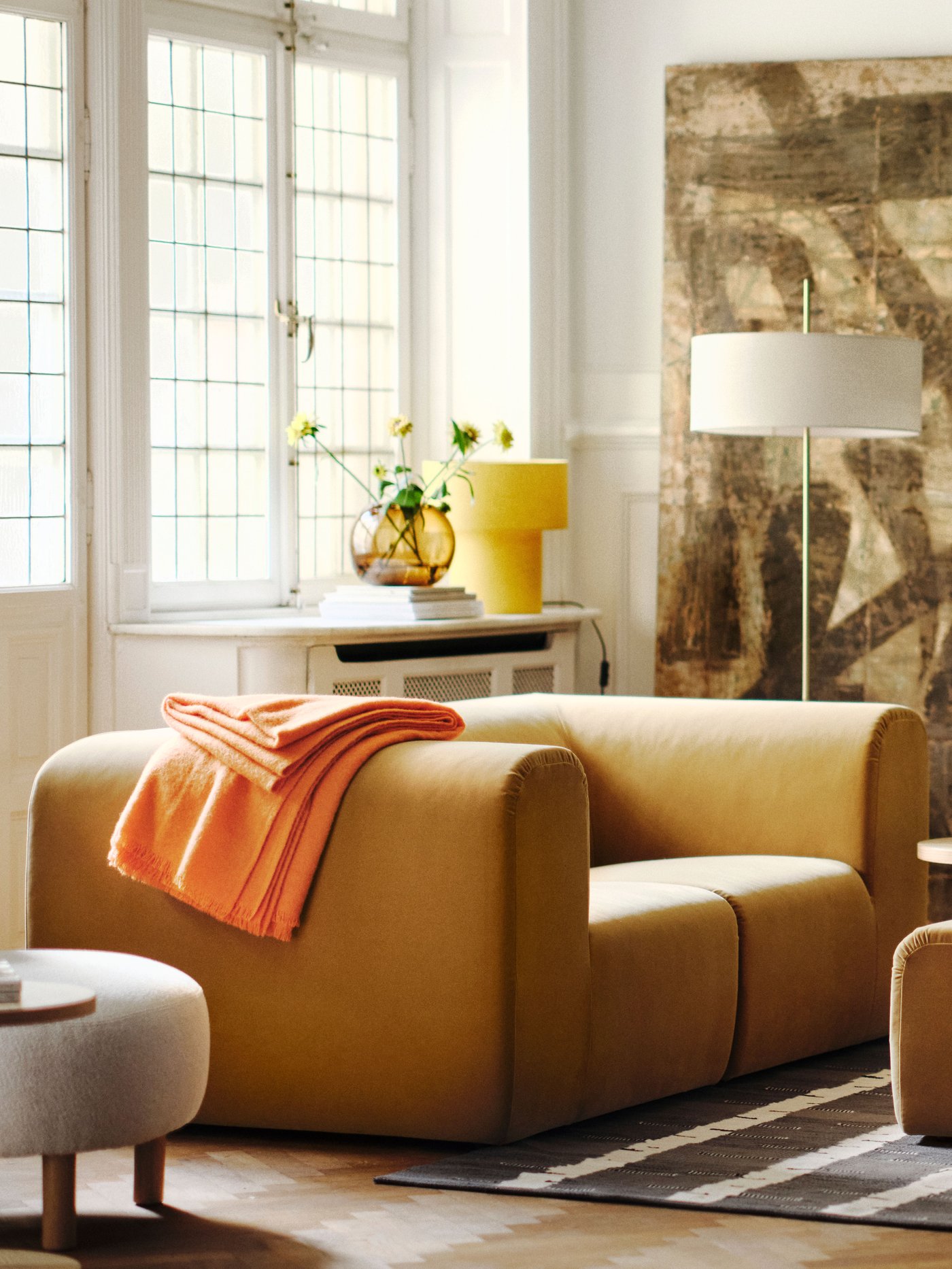 A Djurmo grey/white STOCKHOLM 2025 armchair in the living room