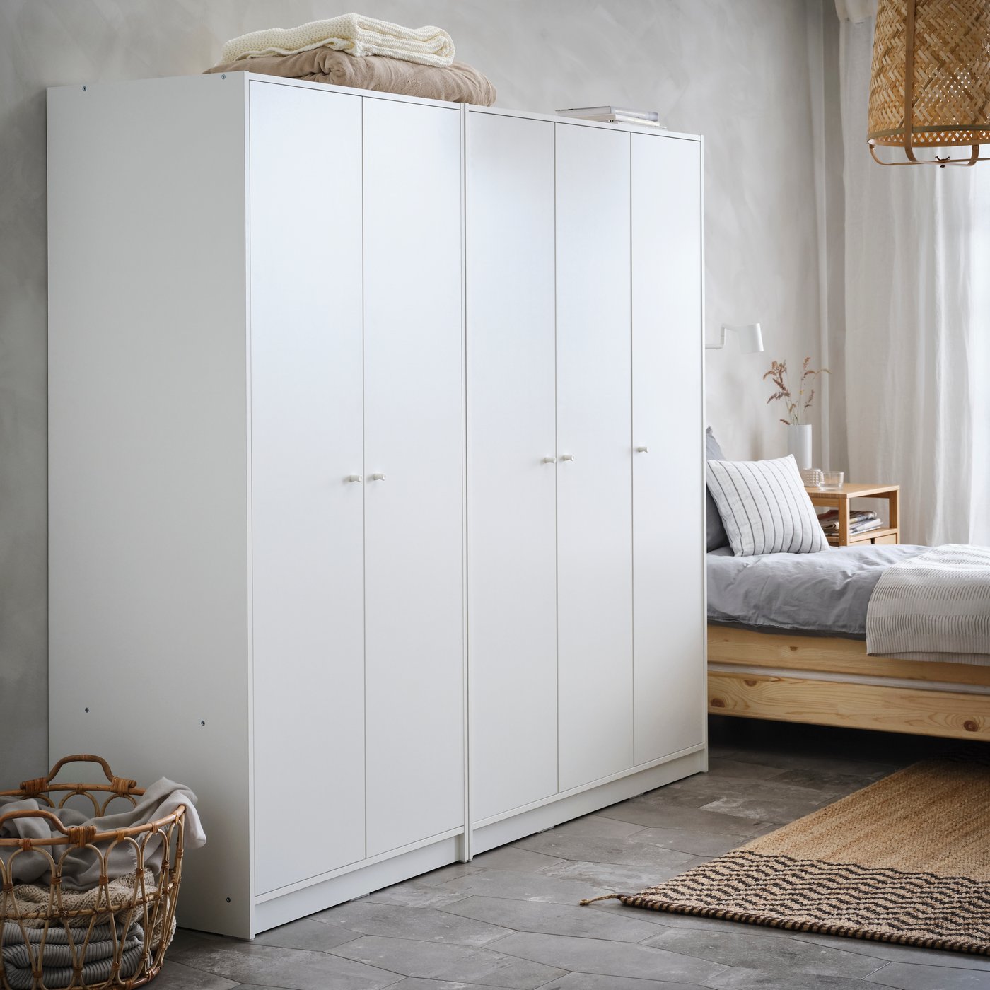 A white KLEPPSTAD wardrobe with 3 doors