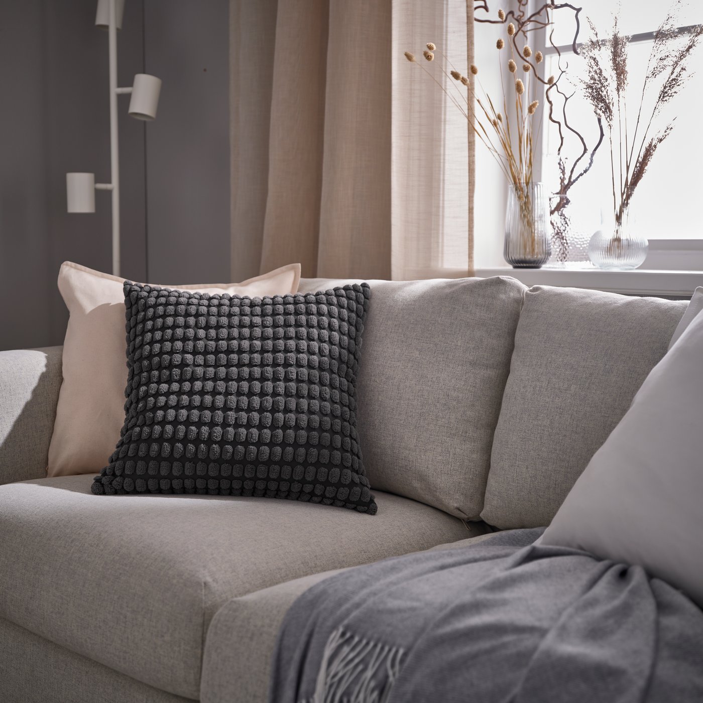 A light beige/with heading tape HÄLLEBRÄCKA sheer curtains, 1 pair in the living room