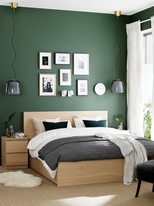 A white stained oak veneer MALM chest of 2 drawers in the bedroom