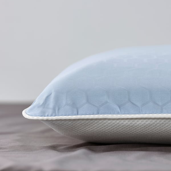A KVARNVEN ergonomic pillow, side/back sleeper
