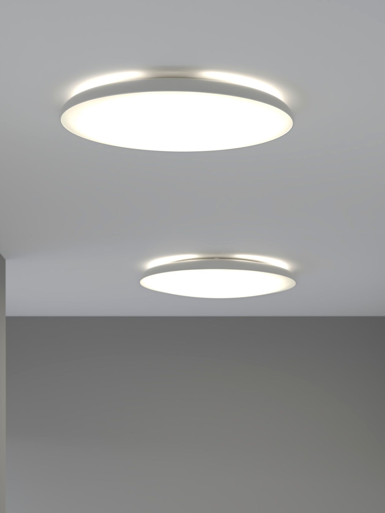 En vit NYMÅNE LED-taklampa.
