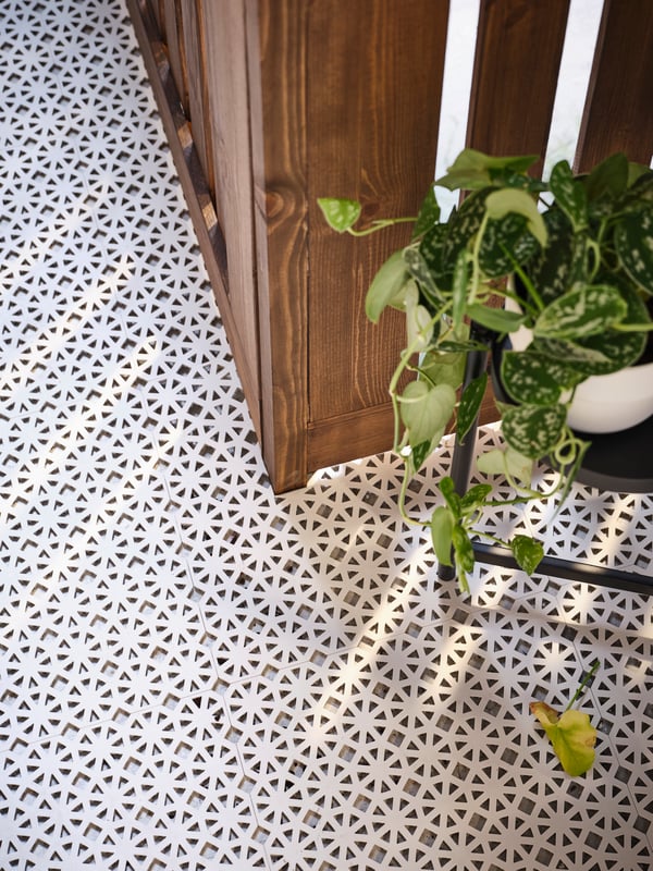 An in/outdoor black OLIVBLAD plant stand
