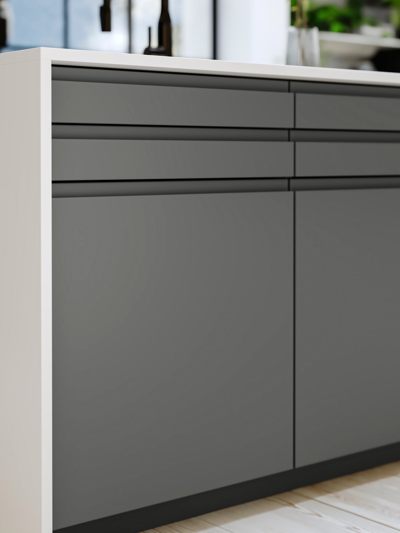 A white quartz KASKER custom made worktop in the kitchen