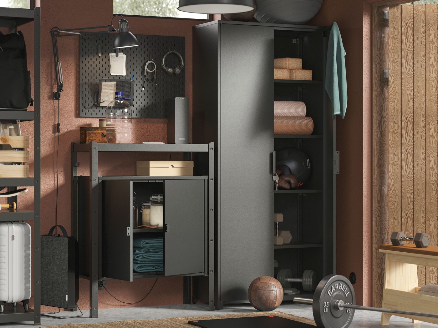 A neatly arranged garage corner with equipment and accessories in a BROR storage combination lit by a TERTIAL work lamp.