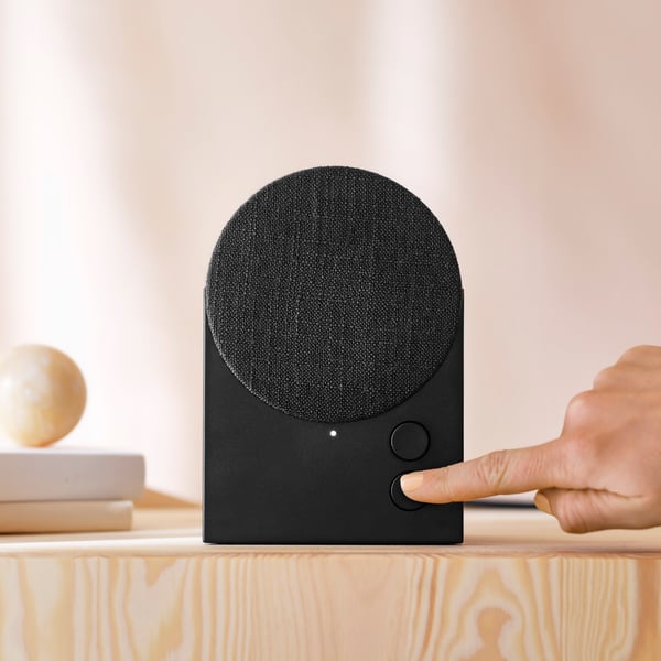 A black NATTBAD Bluetooth speaker