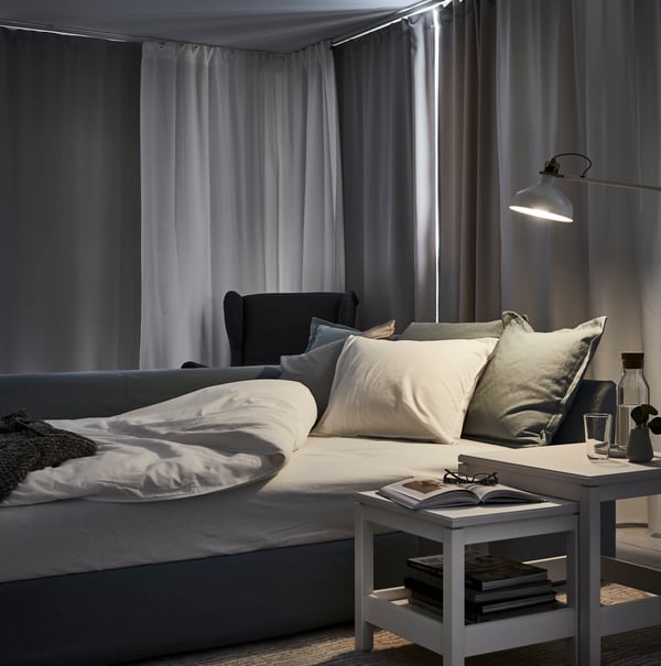A white/with heading tape TIBAST curtains, 1 pair in the living room