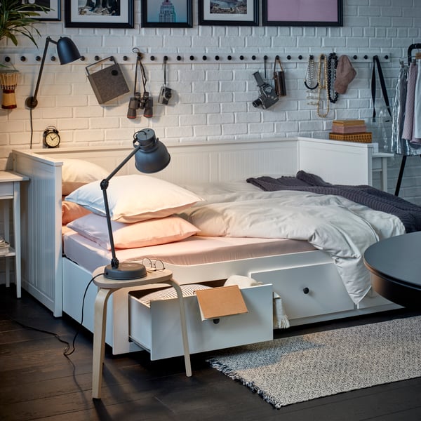 A black ENEBY bluetooth speaker in the bedroom