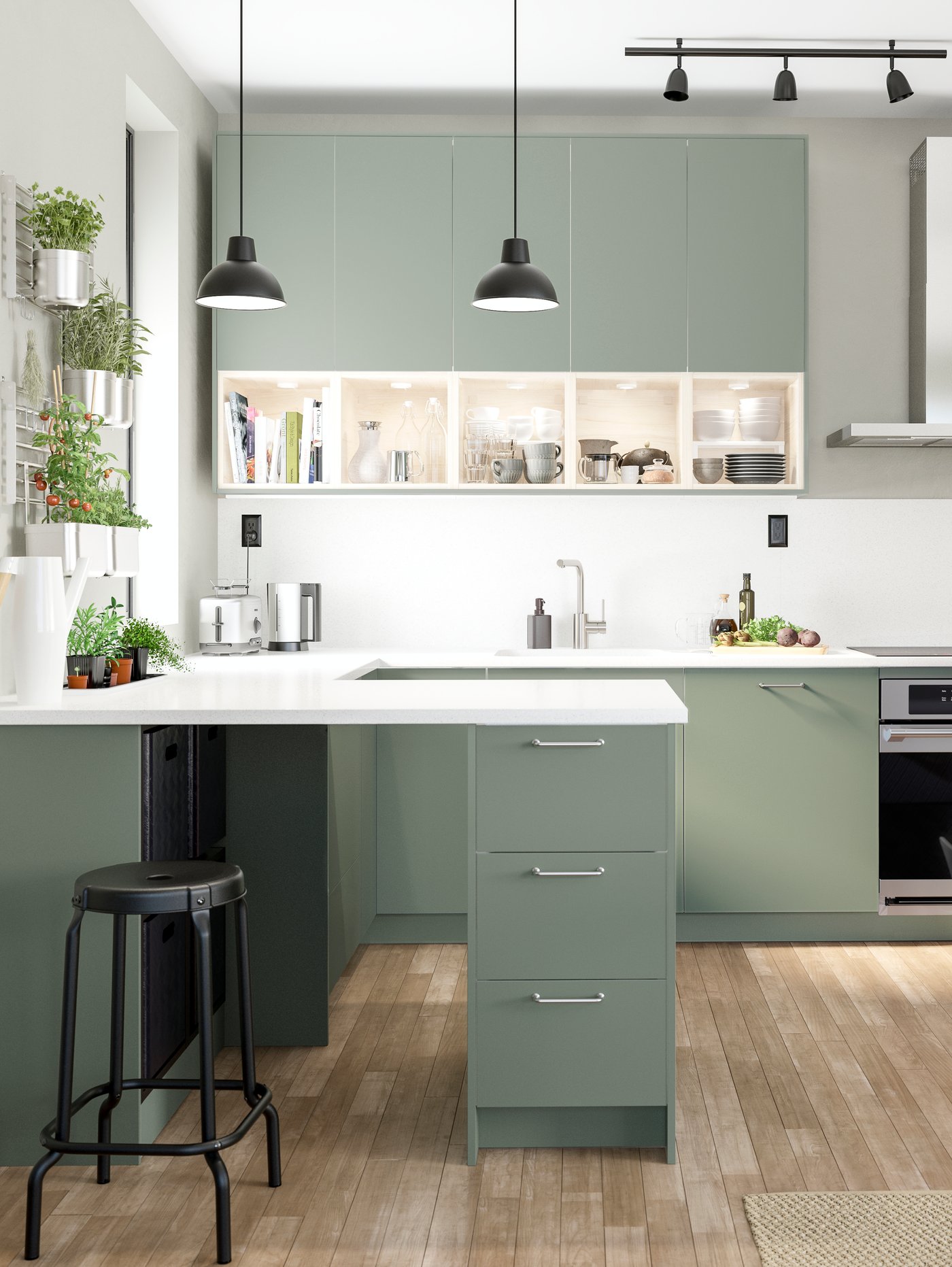 A stainless steel KORTVARIG wall mounted extractor hood in the kitchen