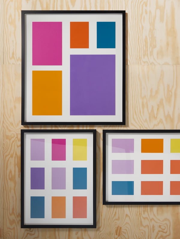 A black RÖDALM frame for 5 pictures