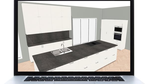 An open laptop displaying a 3D kitchen on the screen. The kitchen features white cabinets, a kitchen island, and gray countertops.
