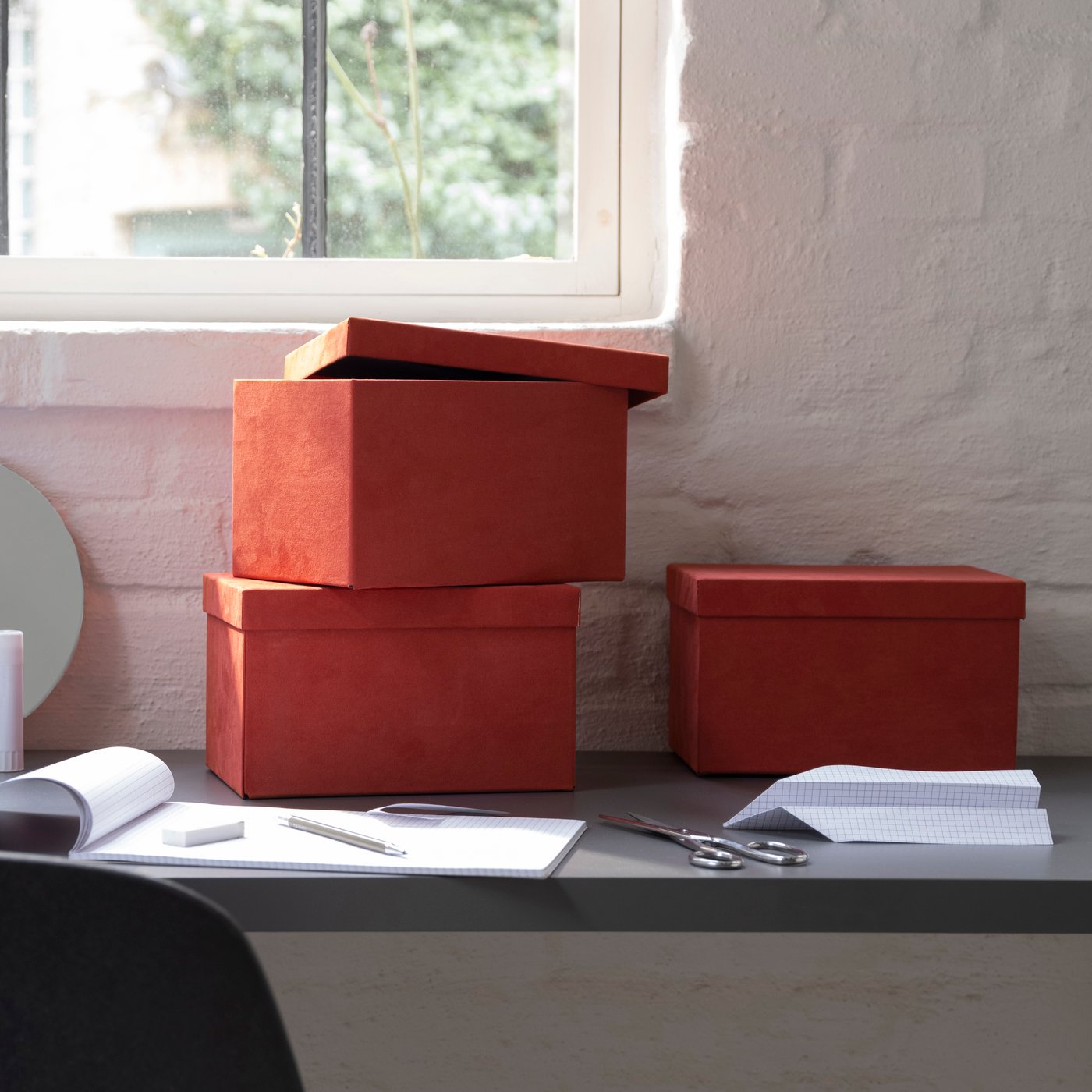 A velvet brown-red GJÄTTA storage box with lid