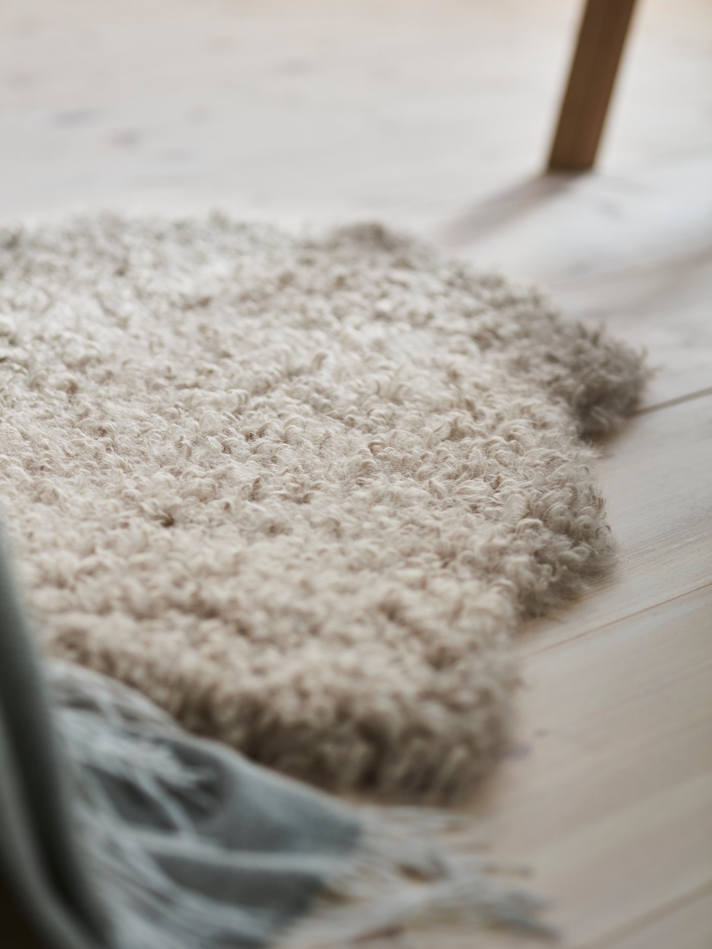 A beige SVINDINGE rug