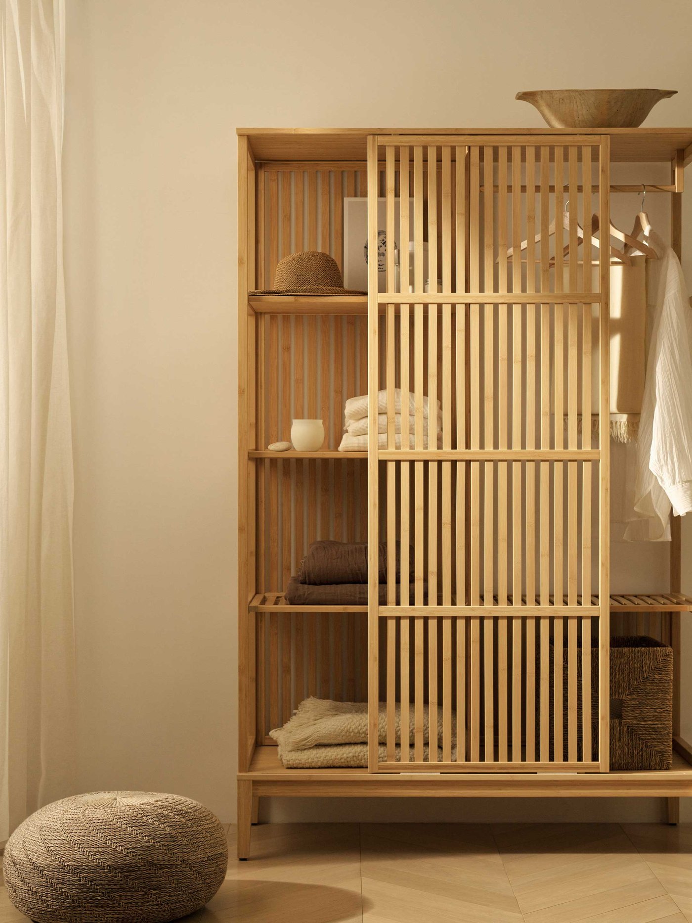 A bamboo NORDKISA open wardrobe with sliding door