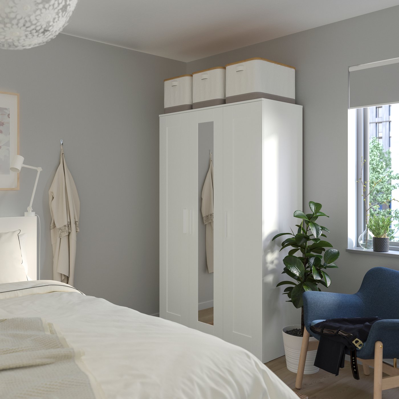 A white BRIMNES wardrobe with 3 doors