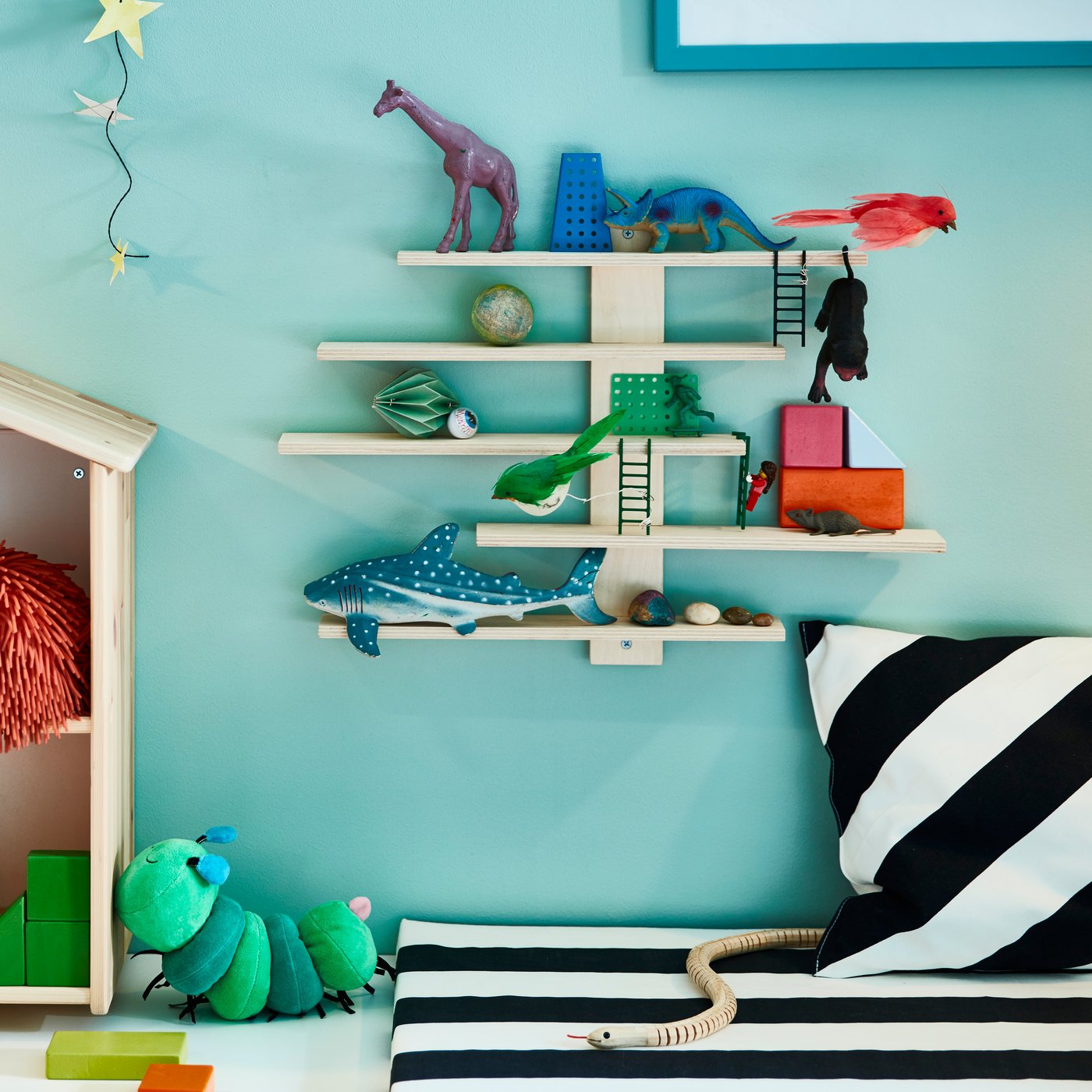 A LUSTIGT wall shelf in the bedroom