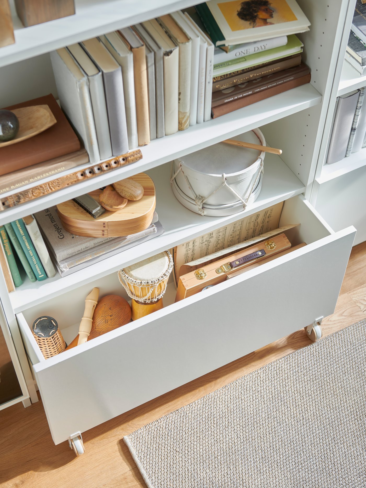 A white/with castors BILLY drawer
