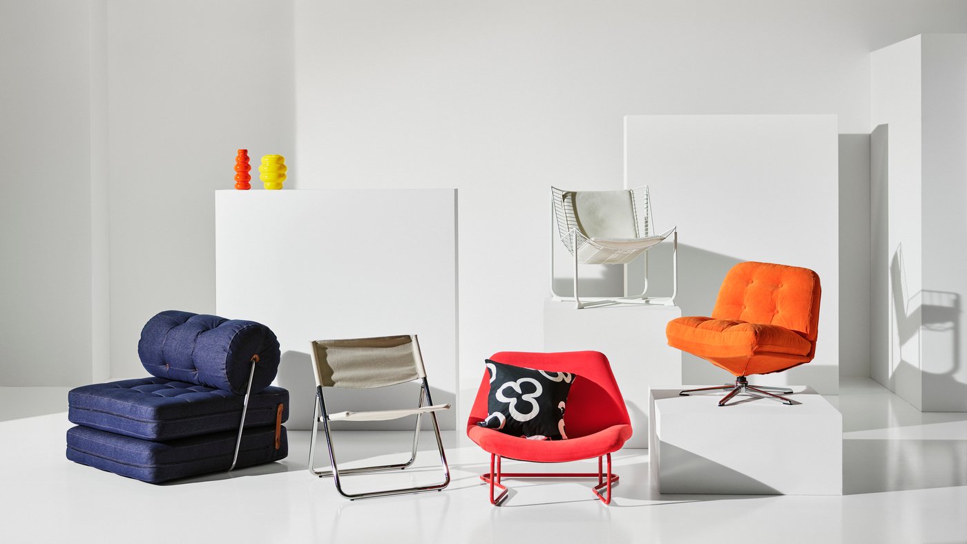 A Kelinge orange DYVLINGE swivel armchair