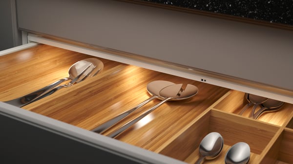 A dimmable white MITTLED LED ktchn drawer lighting w sensor in the kitchen