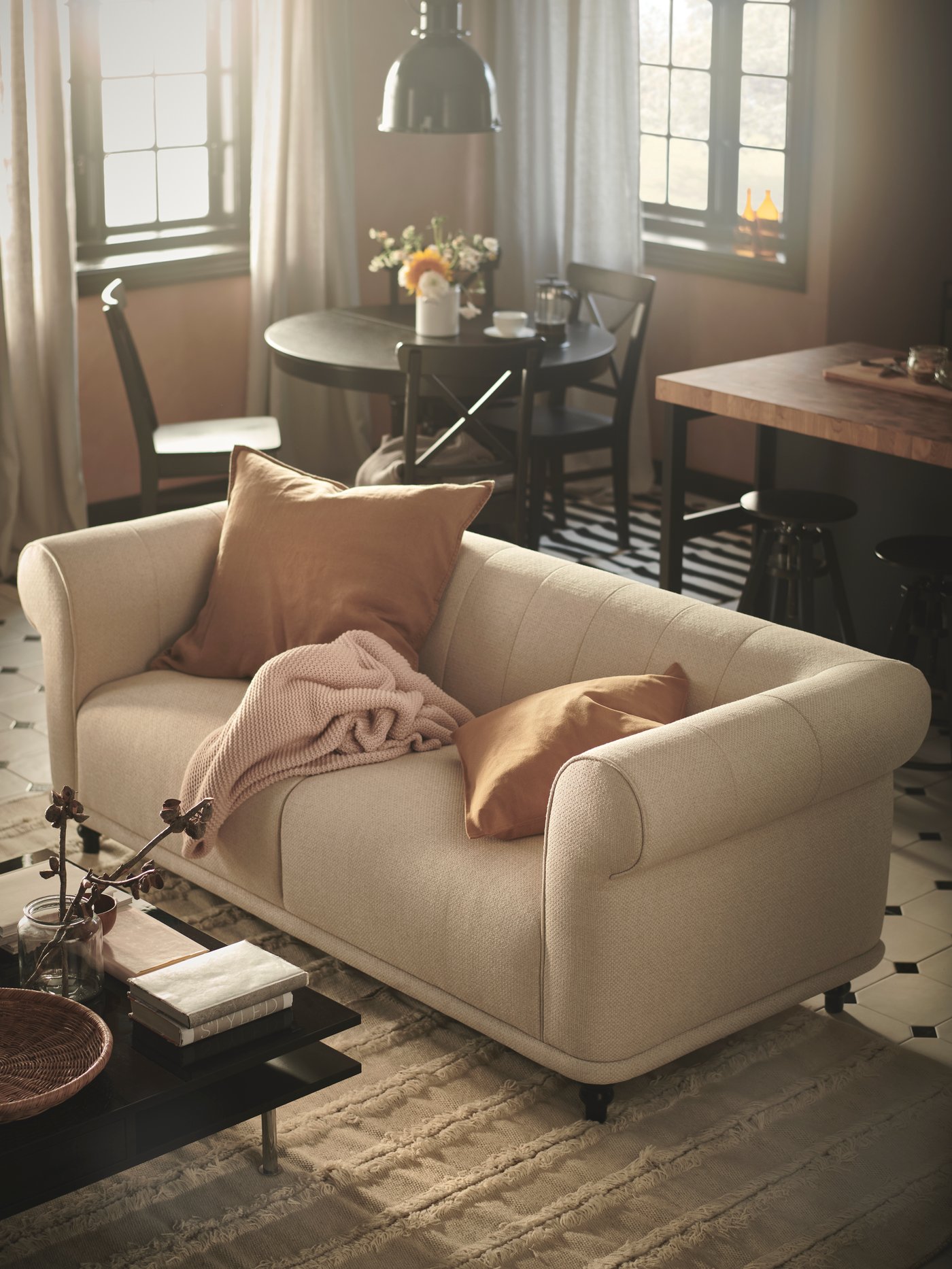 A dark beige DYTÅG cushion cover