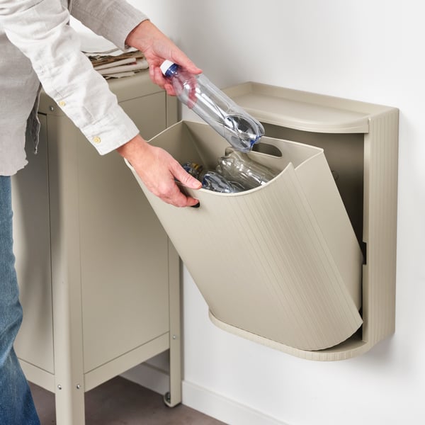 A grey-beige GÅRDSBUTIK bin with lid