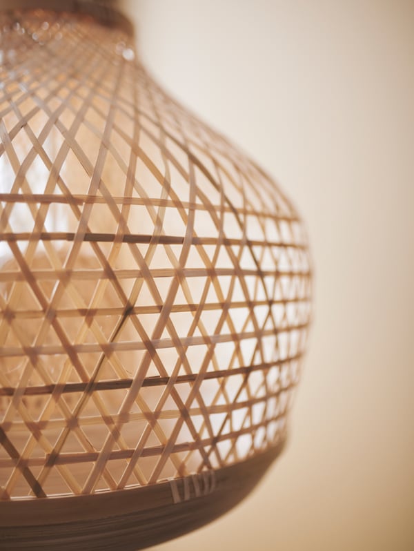 The MISTERHULT pendant lamp is made of hand-woven bamboo.