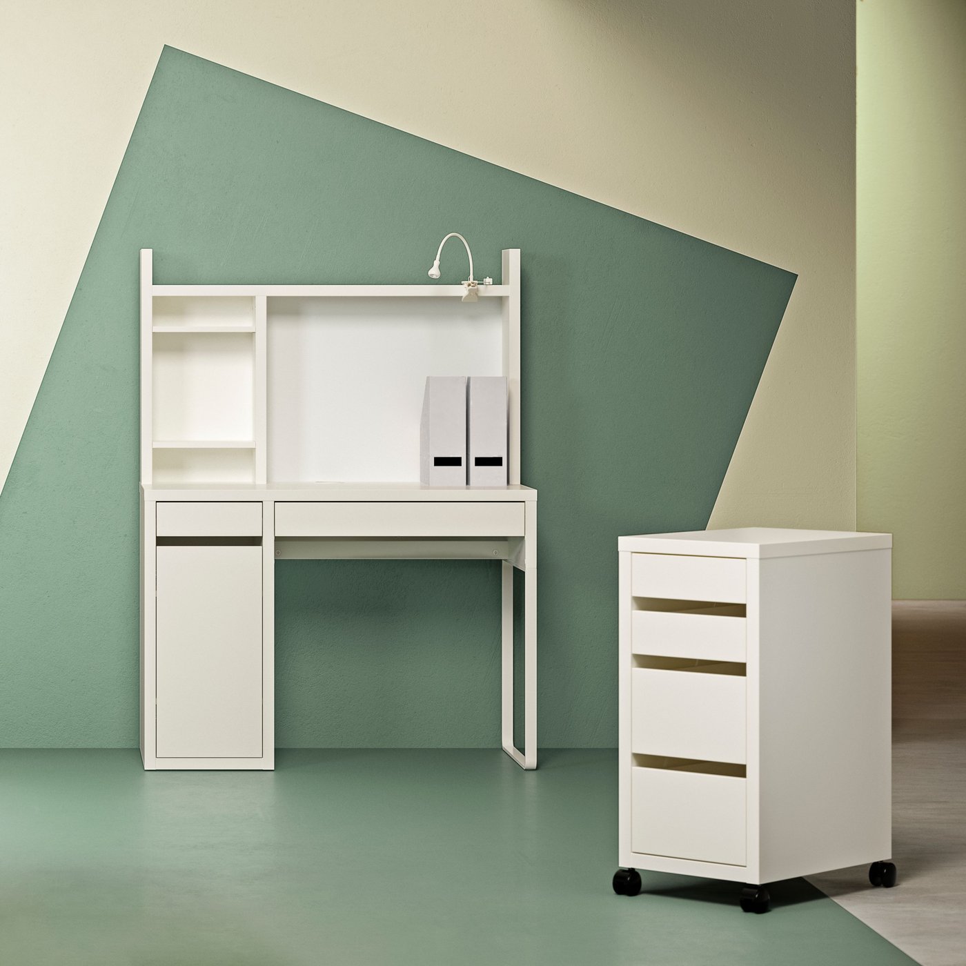 A white MICKE drawer unit on castors