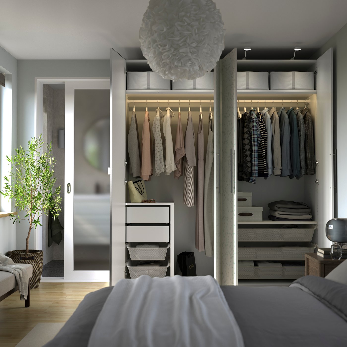 A white patterned/mirror glass PAX wardrobe combination